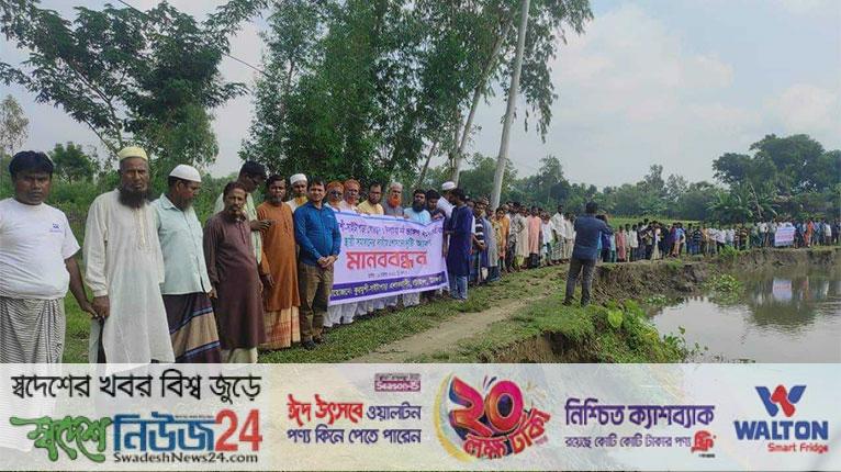 ঘাটাইলে নদীভাঙন থেকে কবরস্থান রক্ষায় মানববন্ধন 9 kobor